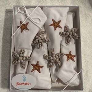 Set of 4 cloth napkins and ring napkin holder by Rightside Design.  Starfish